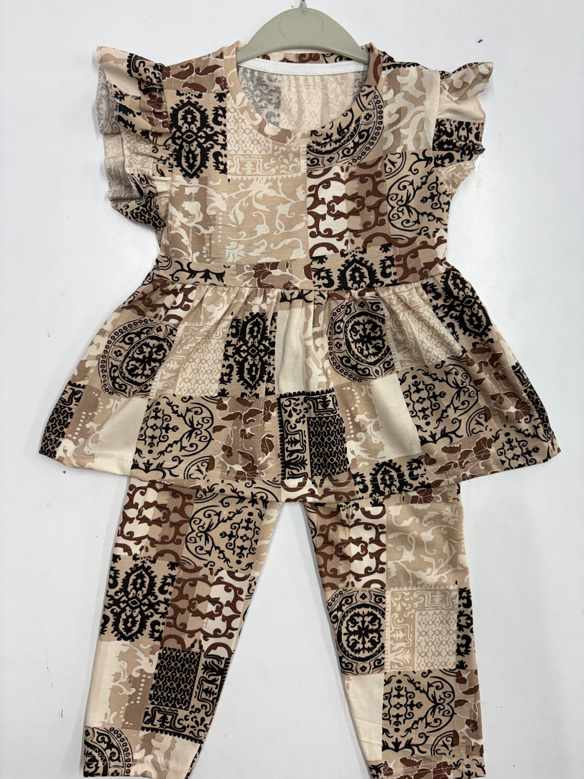 Cream with a brown peplum co - ord girls set Sep