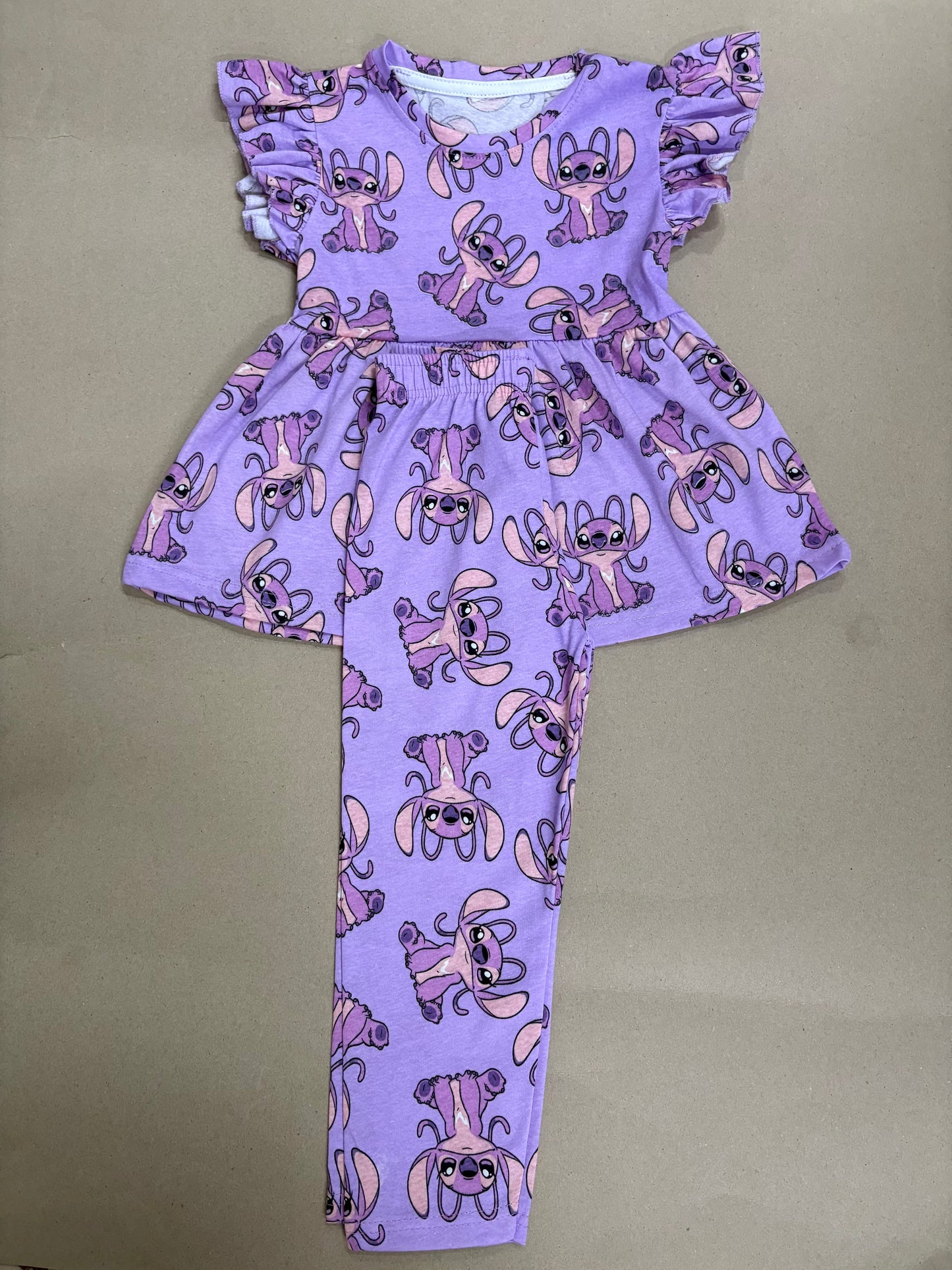 Purple Stitch character graphic21/8-Peplum Girls set