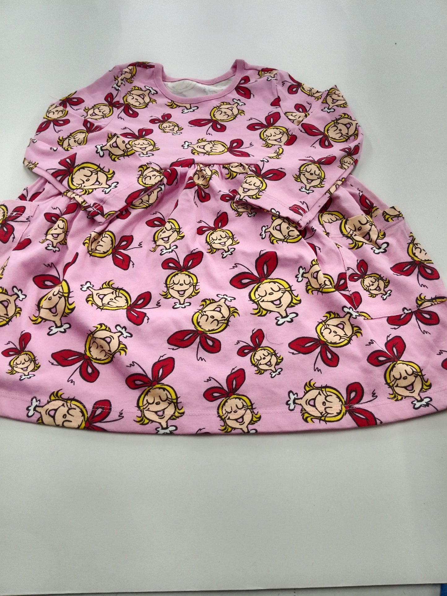 Pink girl with packet - full sleeve frock